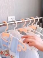 10Pcs Adorable White Bowknot Clothes Hangers - Lightweight, Durable Plastic, Heart & Mustache Design For Efficient Storage Of & Outfits, Accessories - Image 6