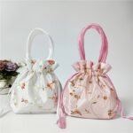 1Pc Elegant Floral Embroidered Clutch For Women - Chic Drawstring Bucket Bag With Polyester Lining, Perfect For Coins & Phone, Available In White & Pink, Cute Purse