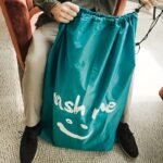 1-Pack Large Travel Laundry Bag With Wash Me Print - Durable Nylon Multi-Functional Organizer For Clothes, Towels & Bedding - Machine Washable & Dry Cleanable (Black & Turquoise), Portable Washing Bag, Easygrip Handle - Image 2