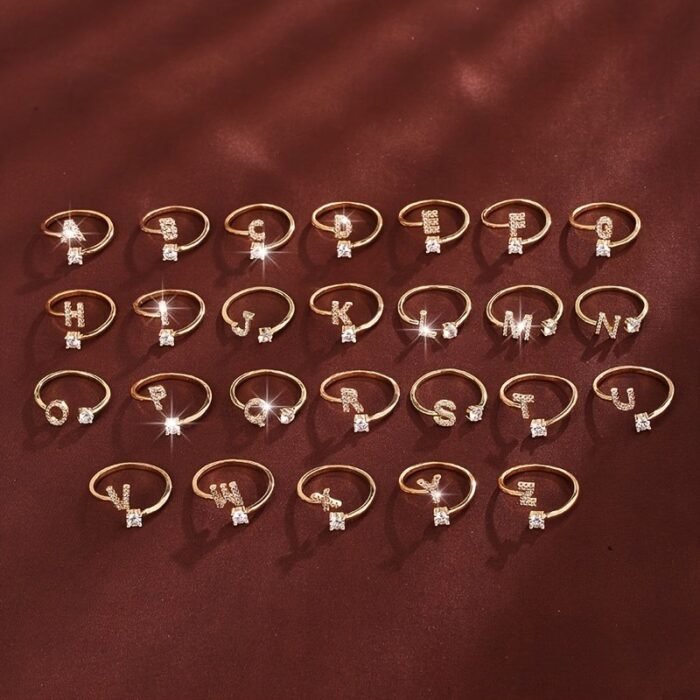 Fashionable 26 English Letters Four-Prong Synthetic Synthetic Zirconia Open Adjustment Ring - Image 1