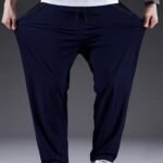 Men'S Plus Size Polyester Sports Pants - 100% Polyester, Casual Style, Slight Stretch Fabric, Solid Color, Spring/Summer, Regular Fit, Adult Weekend Casual Trousers With Woven Technique