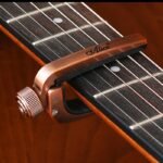 Guitar Capo For Electric & Acoustic Guitars - Single-Handed Trigger, Alloy Construction, 3 Colors (Black/Red/Golden) - Secure Tune Clamp For Bass, Violin, Ukulele, Guitar Capo, Versatile Music Tool, Sleek Metallic Finish, Durable Metal Clamp - Image 7