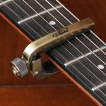 Guitar Capo For Electric & Acoustic Guitars - Single-Handed Trigger, Alloy Construction, 3 Colors (Black/Red/Golden) - Secure Tune Clamp For Bass, Violin, Ukulele, Guitar Capo, Versatile Music Tool, Sleek Metallic Finish, Durable Metal Clamp - Image 5