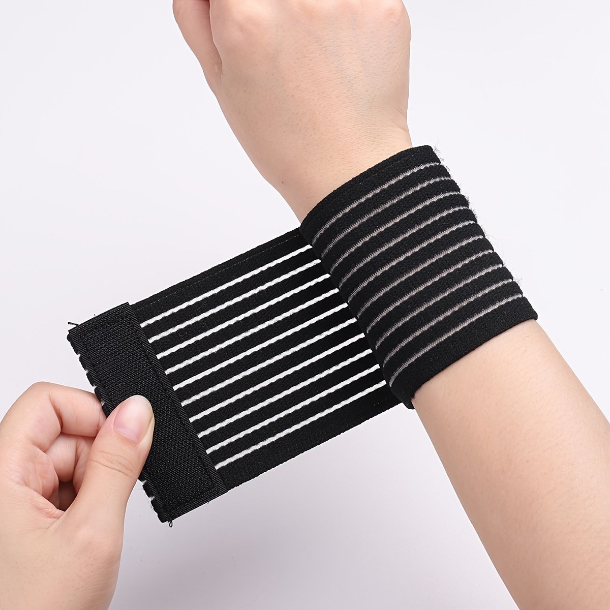 product-Fancyalgo-VirtualModelMatting-0b848b2e53e329bbe0e5a46f25e026c8.jpg 1Pc Compression Adjustable Wrist Sleeve Wrist Brace Wristband, Suitable For Fitness Training - Image 1