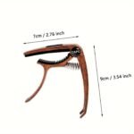 3-In-1 High-Quality Zinc Alloy Metal Guitar Capo - Includes 1 Metal Guitar Pick. Suitable For Capo, Pick Storage, And Bridge Pin Puller. Compatible With Acoustic, Electric, Classical, And Ukulele Guitars - Image 2