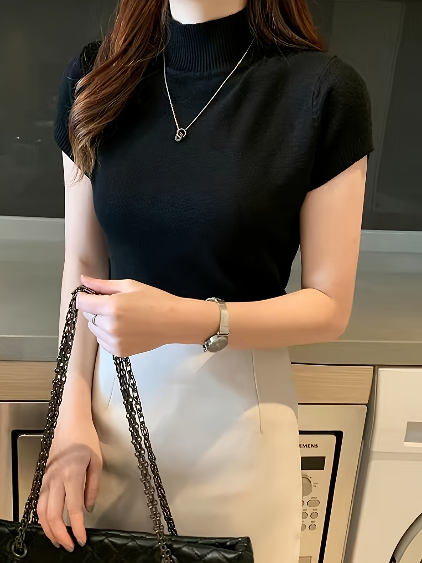 product-Fancyalgo-VirtualModelMatting-bf702241a379ae0fe9fb14f8e8b43344.jpg New Style Knitted Versatile Design Half-High Collar Short Sleeve Thin Pullover - Image 1