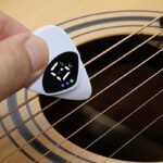 1Pc Qijistar 2-In-1 Guitar & Ukulele Tuner And Pick Combo With Digital Display, 12-Tone Equal Temperament, Portable Tuner With Built-In Pick - Compatible With Acoustic/ Guitars, Bass, Ukuleles - Ideal For Beginners & Professionals - Compact & User-Friendly Design With Clear Display & One-Touch Operation