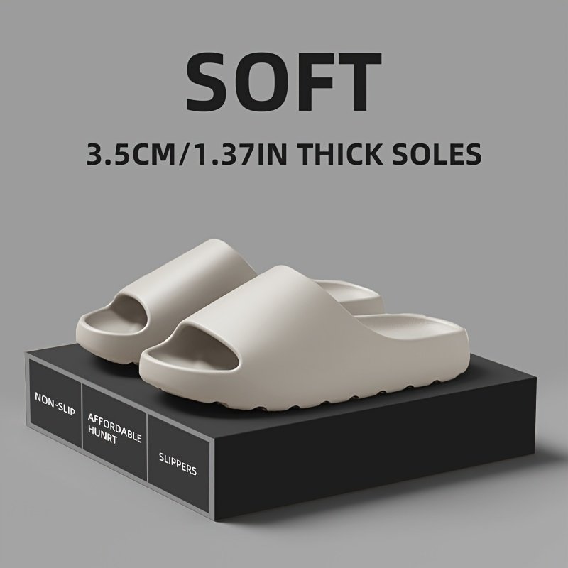 product-fancy-21572249-1b31-47df-8bb5-b3c2f0617a1b.jpg Lightweight Eva Slippers For Men And Women - Non-Slip, Comfortable Indoor And Outdoor Wear, White With Black Accents, All-Season Wear, Casual Home Shoes|Minimalist Design|Eva Upper Material - Image 1