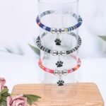 Nylon Pet Necklace With Colorful Paw Print Pendant - Adjustable Cat And Small Dog Collar With Ethnic Design - Durable And Stylish Pet Accessory - Image 4