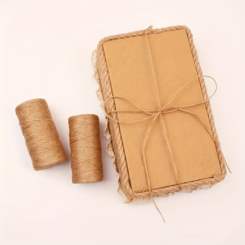 product-fancy-3875de12-4841-40b6-b1c3-18c42925f958.jpg 100M Natural Jute Twine - Heavy-Duty Rustic Fiber Rope For Gardening, Crafts, Wedding Decorations, Plant Wrapping & Rustic Home Decor - Twine With Natural Brown Color & Rough Texture (No Processing) - Durable Fabric Material For Arts & Crafts, Rustic Tools & Lawn Care, Perfect For Gift Wrapping And Decorative Projects, Craft Enthusiasts - Image 1