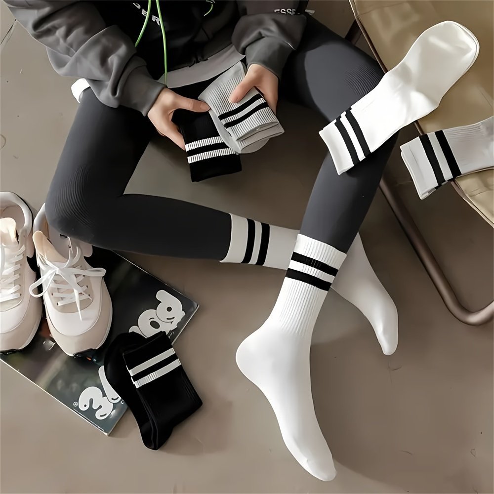 product-fancy-4b6d2df7-b7a7-46b5-823b-a6b0b380f09d.jpg 3 Pairs Breathable Sports Socks - Moisture-Wicking Mid-Calf Crew Socks With Black & White Stripes, Soft Polyester For Gym, Running, Hiking - All-Season Casual Athletic Socks, Gym Essentials, Striped Pattern, Sweat Absorption - Image 1