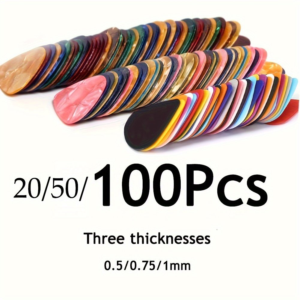 product-fancy-71124bf3-b9fe-47d5-a81e-967fbf10e1f2.jpg Mixed Pack Of Guitar Picks In Three Sizes, Available In Sets Of 20, 50, Or 100. - Image 1