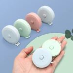1Pc 60-Inch Retractable Double-Sided Mini Soft Tape Measure - Portable One-Click Ruler With Dual Hooks For Sewing, Tailoring, Knitting Crafts & Body/Fabric Measurement, Tape Measure For Sewing, Sewing Essential, Tailoring Tool, Compact Design, Durable Mechanism, Smooth Casing, Body Measurement, Sturdy Construction, Diy Hobbyists - Image 5