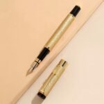 Ergonomic Golden-Tone Matte Metal Fountain Pen | 0.5Mm Iridium Nib For Smooth Writing & Calligraphy | Black Clip | Decorative Crown Design | Ideal For Office Use, Daily Writing Pen | Luxury Fountain Pen | Matte Metal Pen - Image 10